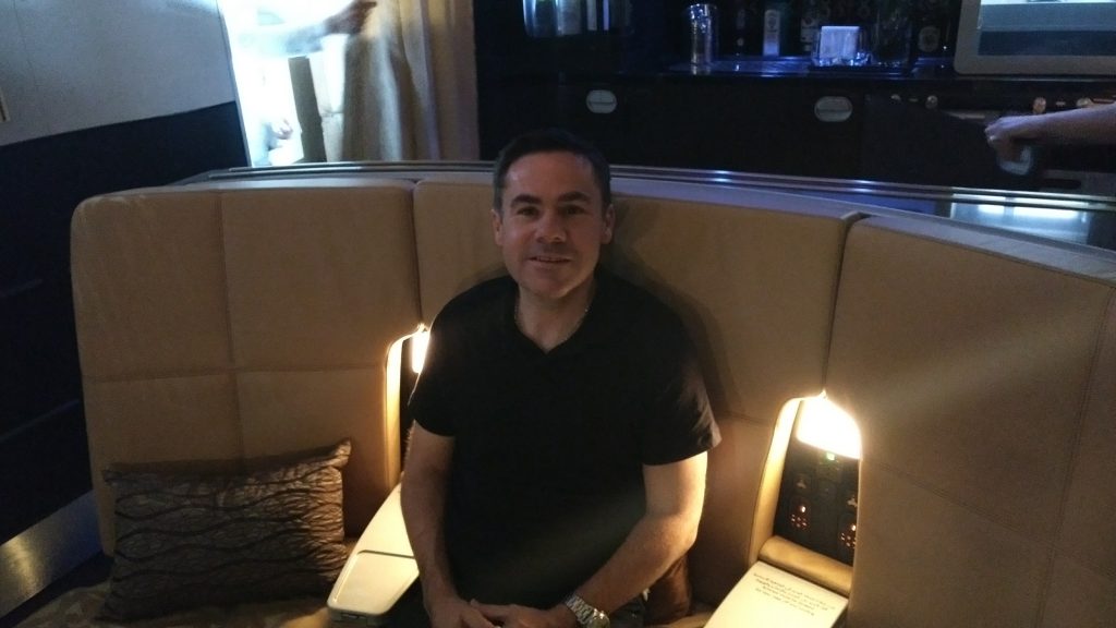 Me in the onboard lounge in Etihad Business Class