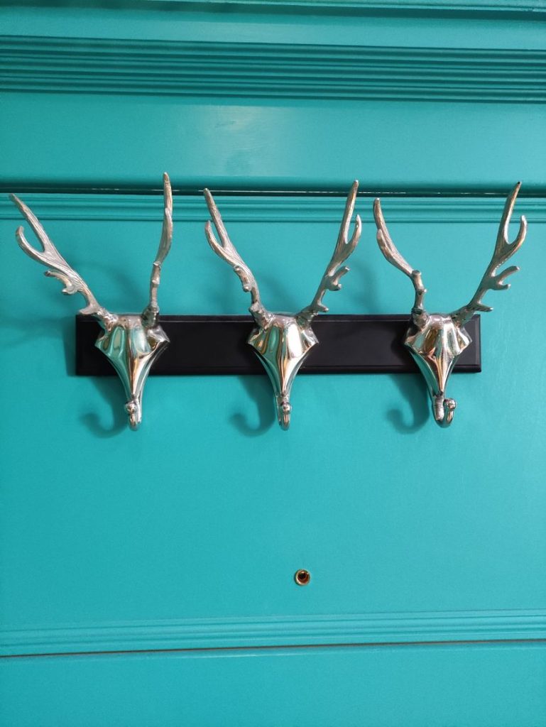 Coat hooks shaped like deer