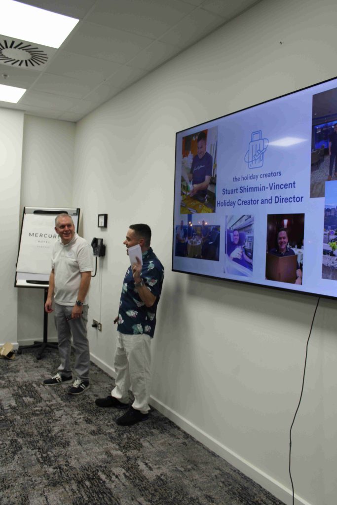Stuart and Chris Presenting at the around the world event